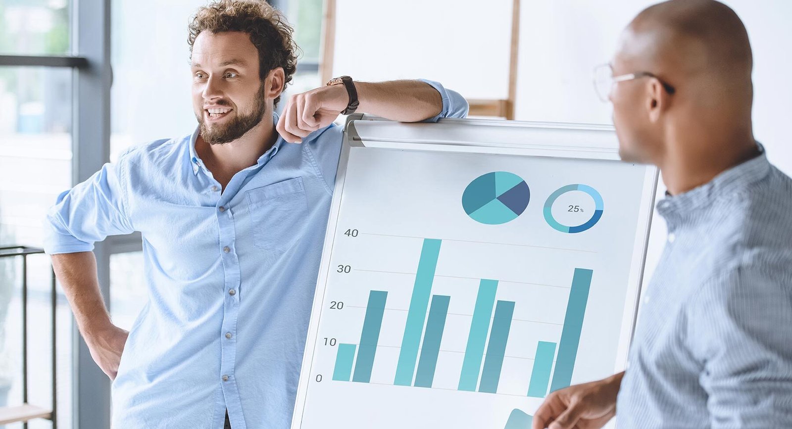 multiethnic businessmen standing near white board 74gv65m